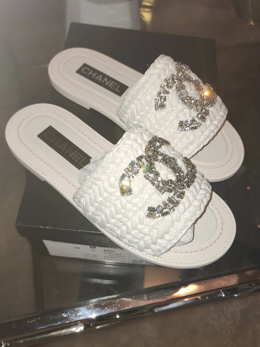 Authenic CHANEL CC CRYSTAL LOGO RAFFIA STRASS  White Braided  CC Slide Mules